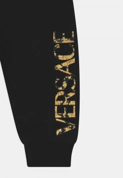 Versace LOGO UNISEX Pantalon Classique Nero/oro -Versace Soldes 2022 16d8e998f4ff41cdb45fa6311ba38e72