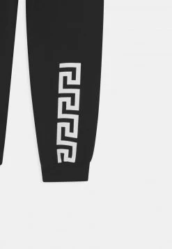 Versace LOGO GRECA UNISEX Pantalon De Survêtement Nero/bianco -Versace Soldes 2022 232de7f93c3f468cad47b5e953399437